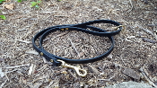 A smaller image of a black leash on the ground
